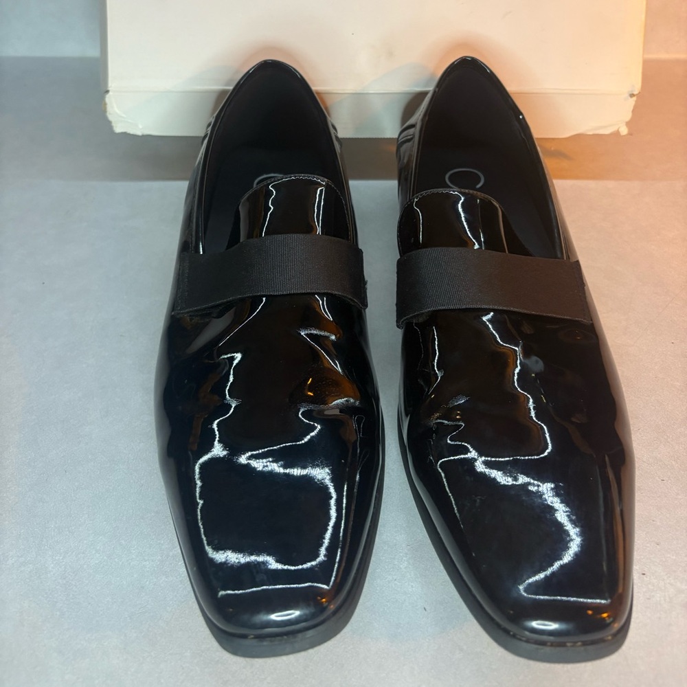 Calvin Klein Glossy Black Slip-On Loafers